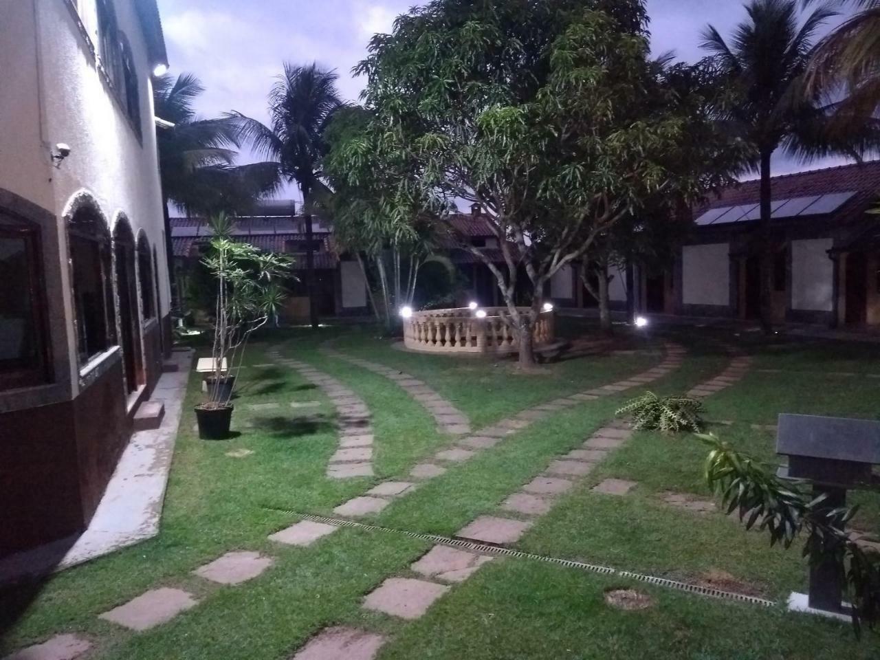 Pousada Nossa Senhora Penedo  Exterior foto The garden of the hotel